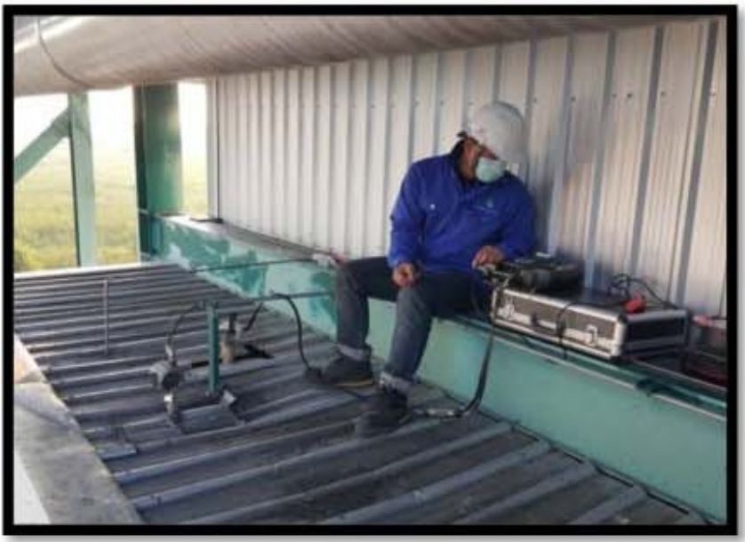 Engineer tuning grate drive on the rice husk fired boiler