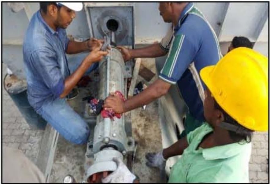 Commissioning team overhauling boiler equipment in Sri Lanka